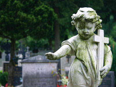 Funeral Homes: A memorial statue in a cemetery